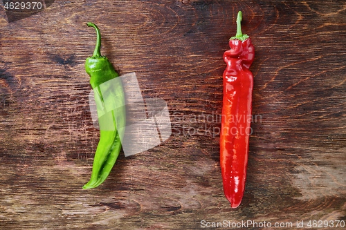 Image of Two peppers on a table