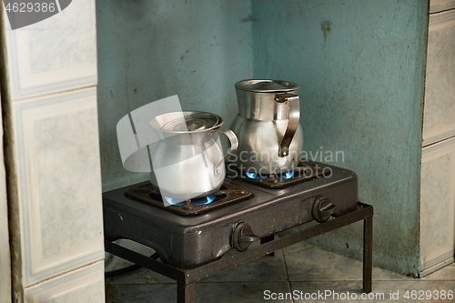 Image of Making coffe on an old stove