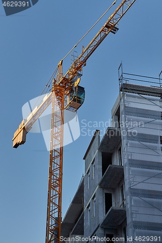 Image of Urban Building Construction With Crane
