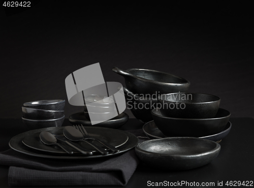 Image of Dishes in minimalistic black design. Pure black.