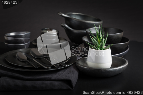 Image of Dishes in minimalistic black design. Pure black.