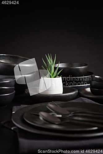 Image of Dishes in minimalistic black design. Pure black.