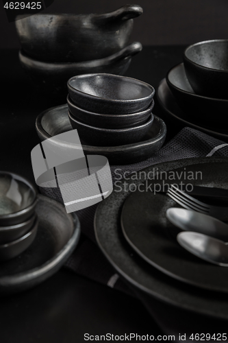 Image of Dishes in minimalistic black design. Pure black.