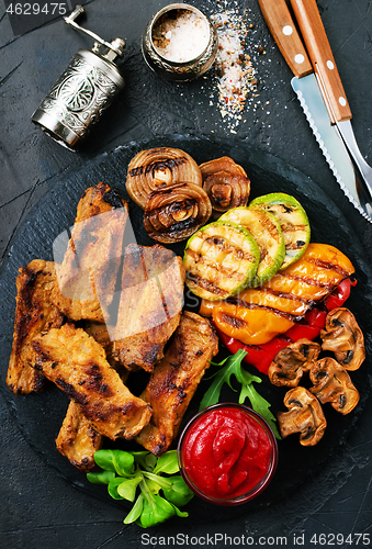 Image of grilled vegetables and ribs