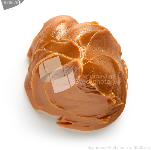 Image of soft caramel on white background