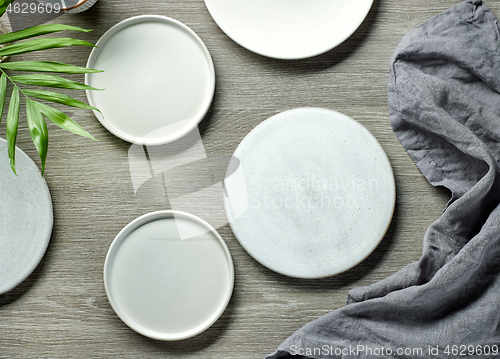 Image of various empty white plates