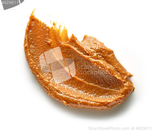 Image of soft caramel on white background