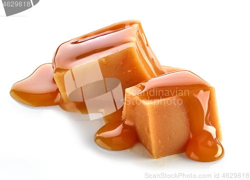 Image of caramel pieces on white background