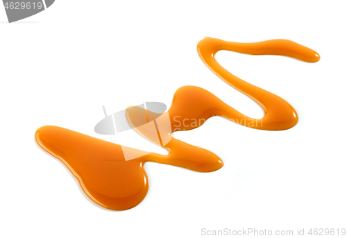 Image of caramel sauce on white background