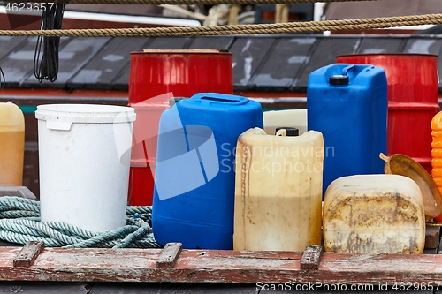 Image of Plastic cans of chemicals