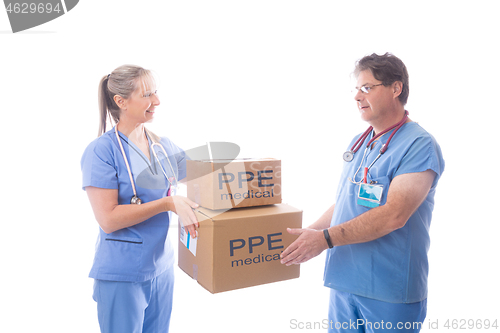 Image of Doctors and nurses receiving a delivery of medical equipment PPE