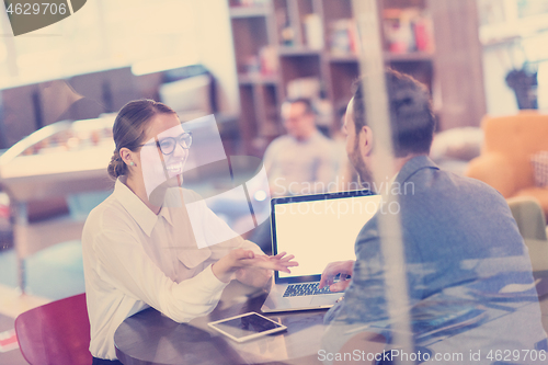 Image of Business team Working With laptop in creative office