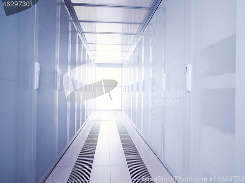 Image of modern server room with white servers