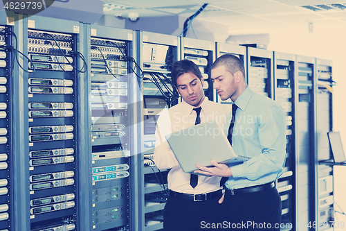 Image of it enineers in network server room