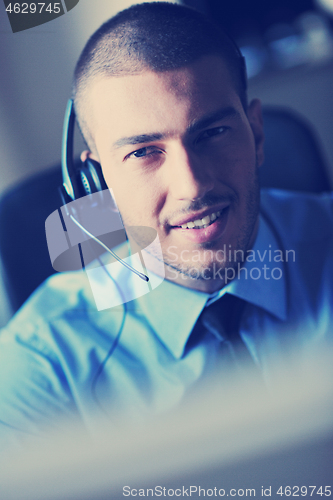 Image of businessman with a headset