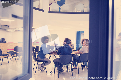 Image of Multiethnic startup business team on meeting