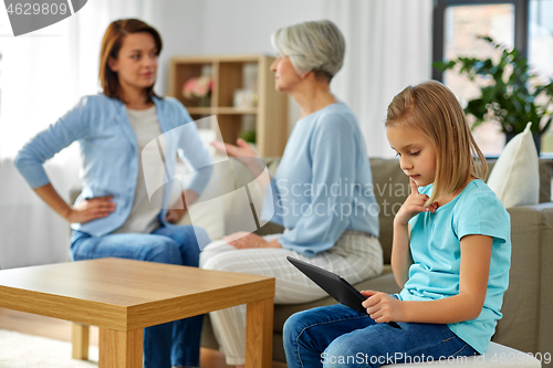 Image of daughter, mother and grandmother arguing at home