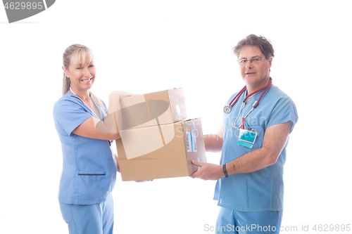 Image of Medical healthcare workers holding a delivery of PPE or equipmen