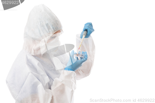 Image of Scientist working in a lab, cure coronavirus, clinical studies