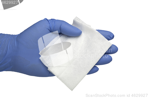 Image of Gloved hand holding an antibacterial cleansing wipe