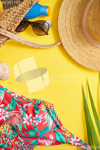 Image of Female beach summer clothes and accessories collage on yellow background