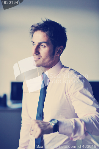 Image of young businessman at office