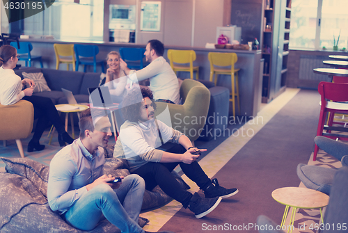 Image of startup Office Workers Playing computer games