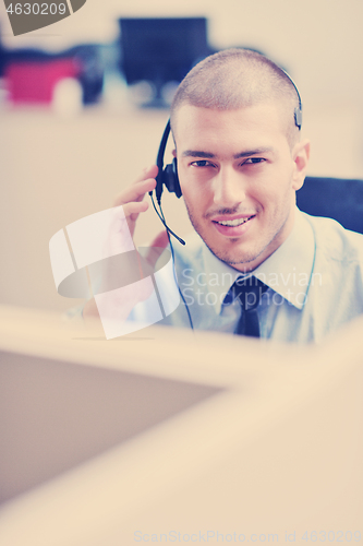 Image of businessman with a headset