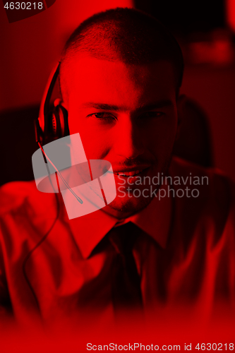 Image of businessman with a headset