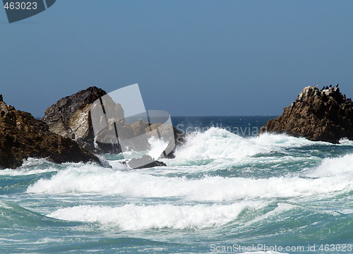 Image of waves breakers amidst rocks at sea shore