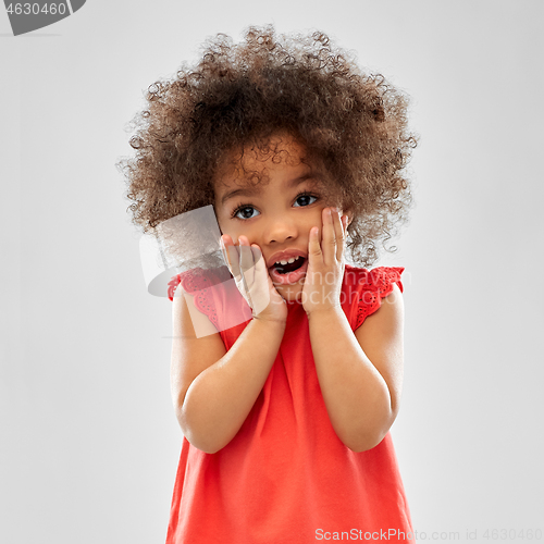 Image of surprised or scared little african american girl