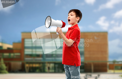 Image of little boy in red polo shouting to megaphone