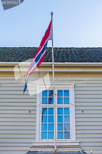 Image of Norwegian Flag at Window