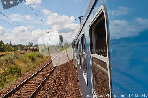 Image of Railroad travel leaning out the window