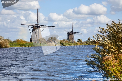 Image of Windmill beside a canal