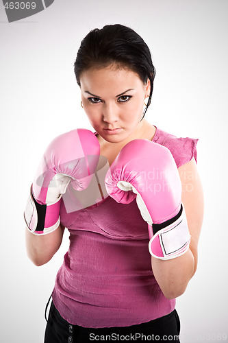 Image of Businesswoman with boxing gloves