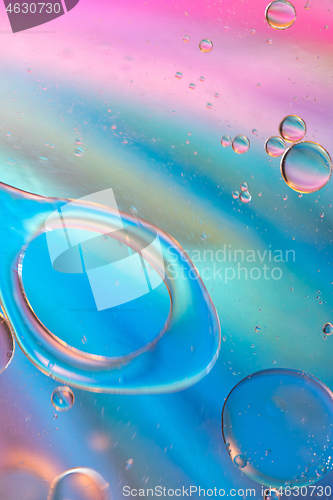 Image of Defocused pastel colored abstract background picture made with oil, water and soap