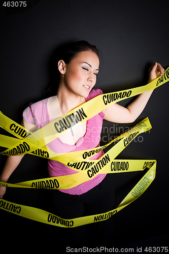 Image of Businesswoman in caution tape