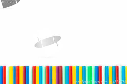 Image of On a white background, cocktail tubes are laid out below