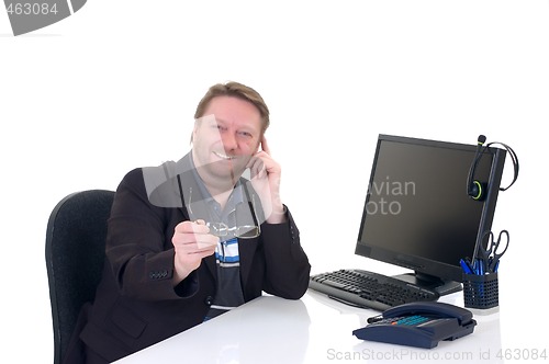 Image of Businessman on desk 