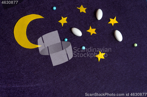 Image of Sky with moon and stars and sleeping pills