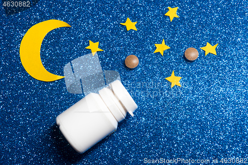 Image of Sky with moon and stars and sleeping pills