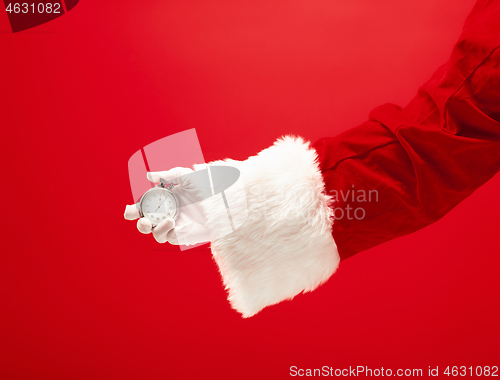 Image of Santa holding a stopwatch in hand