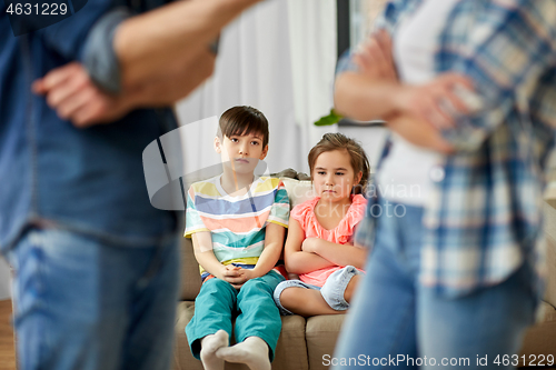 Image of children watching their parents quarreling at home