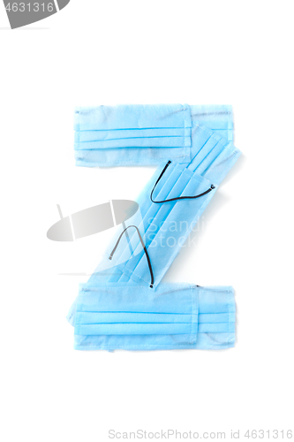 Image of Letter Z made from protective medical masks on a white background.