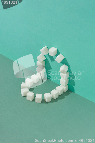 Image of Corner geometric composition from sweet refined sugar cubes.