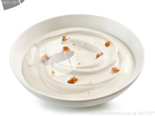 Image of bowl of yogurt with caramel pieces