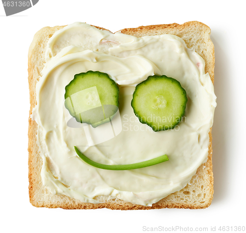 Image of toasted bread with cream cheese and cucumber