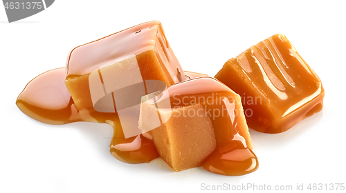 Image of caramel pieces on white background