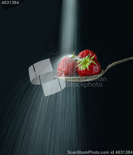 Image of spoon of strawberries